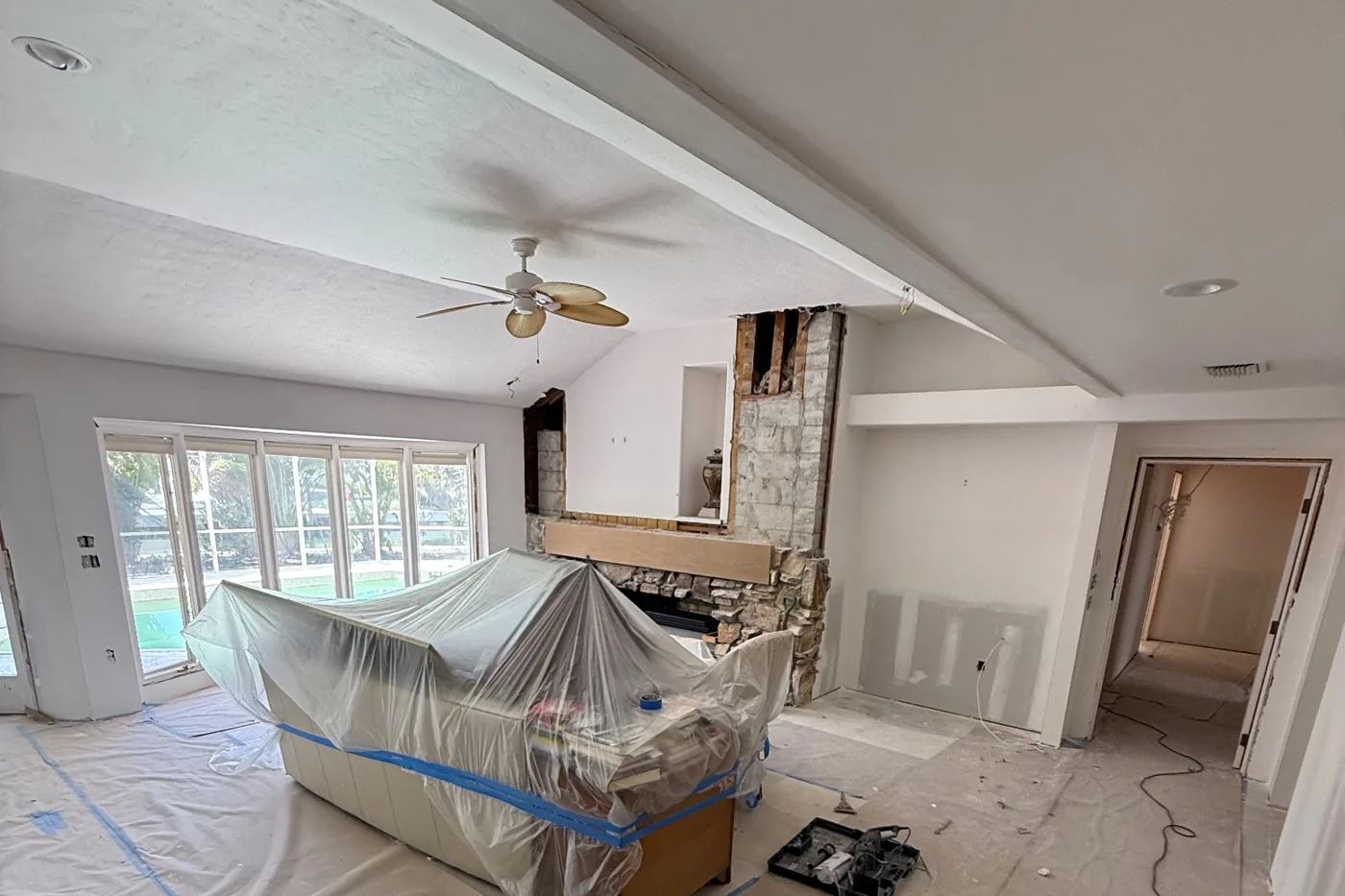 Before: residential living room at the start of the job
